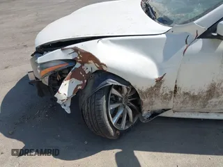 2014 Infiniti Q60 Journey z VIN JN1CV6EK4EM113805, wystawiony jako IAAI lot #42348451 z przebiegiem Nie podano mil oraz . Historia ofert i sprzedaży dostępna na DreamBid. Obrazek 6.