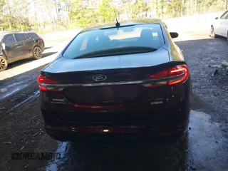 2017 Ford Fusion SE z VIN 3FA6P0HD2HR122650, wystawiony jako IAAI lot #41965411 z przebiegiem 107 227 mil mil oraz . Historia ofert i sprzedaży dostępna na DreamBid. Obrazek 16.