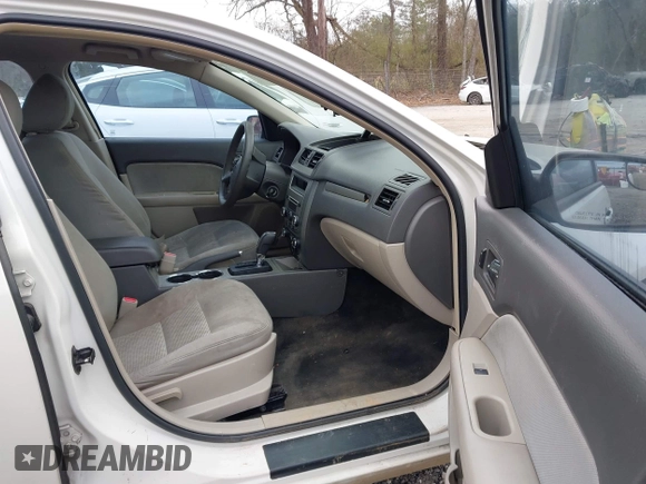 2011 Ford Fusion S with VIN 3FAHP0GA1BR337461, listed as a IAAI auction lot 41715964 with 219,486 mi miles. Bid and sale history available at carsss.com. Image 5.