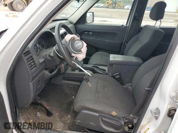 2011 Jeep Liberty Sport with VIN 1J4PN2GK0BW513438, listed as a Copart auction lot 54551905 with 184,157 mi miles and Salvage Title. Bid and sale history available at DreamBid. Image 7.