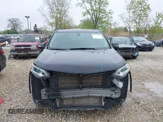 2021 Chevrolet Traverse LT with VIN 1GNERHKW0MJ218426, listed as a IAAI auction lot 42178273 with 76,545 mi miles and . Bid and sale history available at DreamBid. Image 12.