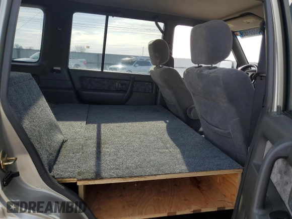 2001 Isuzu Trooper S with VIN JACDJ58X117J11550, listed as a Copart auction lot 46323185 with 236,762 mi miles and Salvage title. Bid and sale history available at DreamBid. Image 11.