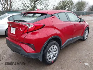 2020 Toyota C-HR LE with VIN JTNKHMBX4L1067648, listed as a IAAI auction lot 41556302 with 64,698 mi miles. Bid and sale history available at carsss.com. Image 4.