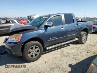 2015 Nissan Titan SL with VIN 1N6BA0EC1FN506809, listed as a Copart auction lot 72825514 with 132,830 mi miles and Salvage Title. Bid and sale history available at carsss.com. Image 1.