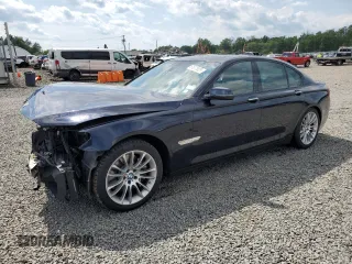 2015 BMW 7 Series 750i xDrive with VIN WBAYB6C58FD966084, listed as a Copart auction lot 61875325 with 159,616 mi miles and Salvage title. Bid and sale history available at DreamBid. Image 1.
