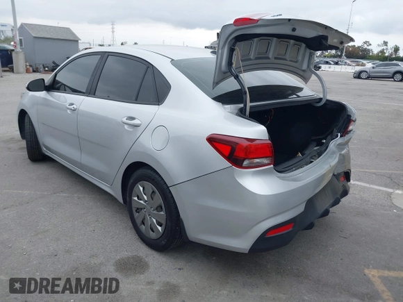 2020 Kia Rio LX with VIN 3KPA24AD7LE313579, listed as a IAAI auction lot 41884205 with 112,586 mi miles and . Bid and sale history available at DreamBid. Image 3.