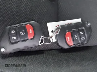 2018 Jeep Wrangler Unlimited Sport с VIN 1C4HJXDGXJW189576, выставлен на аукционе IAAI как лот 41906106 с пробегом 60 463 миль миль и . История ставок и продаж доступна на DreamBid. Изображение 11.