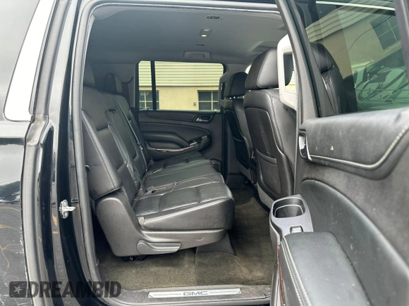 2016 GMC Yukon XL SLT with VIN 1GKS2GKC2GR180580, listed as a Copart auction lot 66899234 with 243,232 mi miles and Clean Title. Bid and sale history available at carsss.com. Image 7.