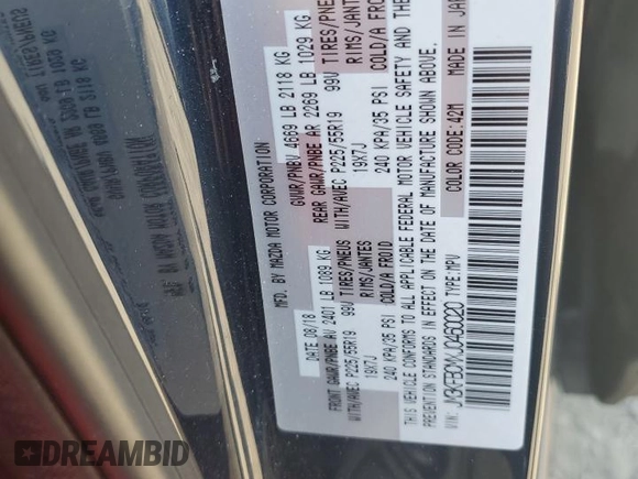 2018 Mazda CX-5 Touring with VIN JM3KFBCMXJ0460020, listed as a Copart auction lot 55997305 with 56,361 mi miles and Salvage Title. Bid and sale history available at DreamBid. Image 13.