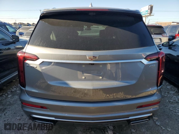 2024 Cadillac XT6 FWD Premium Luxury with VIN 1GYKPCRSXRZ734769, listed as a Copart auction lot 42954995 with 0 mi miles and Salvage Title. Bid and sale history available at carsss.com. Image 6.