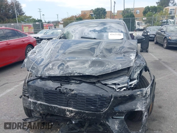 2023 Ford Mustang Mach-E GT z VIN 3FMTK4SE1PMA44650, wystawiony jako IAAI lot #42127300 z przebiegiem 7121 mil mil oraz . Historia ofert i sprzedaży dostępna na DreamBid. Obrazek 12.