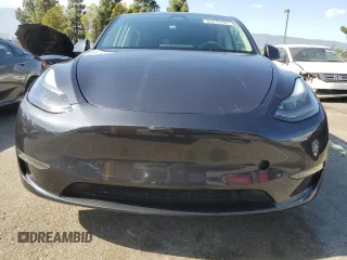 2024 Tesla Model Y with VIN 7SAYGDED7RF056973, listed as a Copart auction lot 55310705 with 15,391 mi miles and Salvage Title. Bid and sale history available at DreamBid. Image 5.