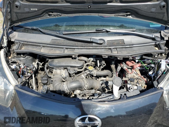 2012 Scion iQ z VIN JTNJJXB01CJ011221, wystawiony jako Copart lot #54149515 z przebiegiem 162 199 mil mil oraz Szkoda całkowita • Salvage title. Historia ofert i sprzedaży dostępna na DreamBid. Obrazek 12.