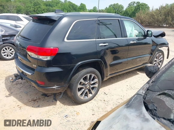 2017 Jeep Grand Cherokee Overland z VIN 1C4RJFCG4HC662884, wystawiony jako IAAI lot #42172826 z przebiegiem 79 305 mil mil oraz . Historia ofert i sprzedaży dostępna na DreamBid. Obrazek 4.