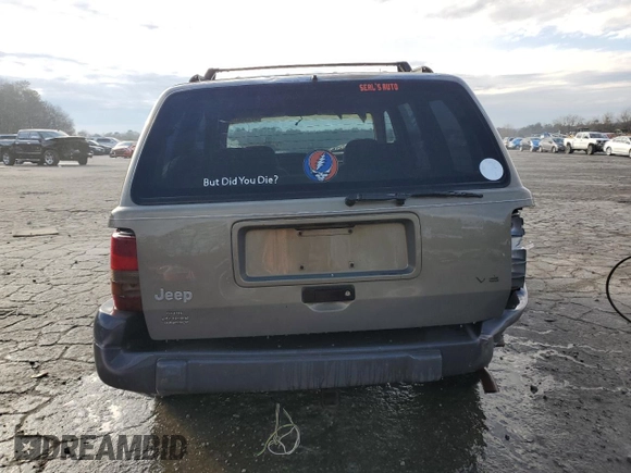 1996 Jeep Grand Cherokee with VIN 1J4EZ58S9TC148692, listed as a Copart auction lot 87730075 with Not provided miles and Salvage title. Bid and sale history available at DreamBid. Image 6.