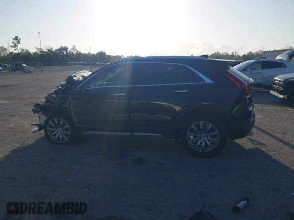 2021 Cadillac XT4 FWD Premium Luxury with VIN 1GYFZCR47MF000064, listed as a IAAI auction lot 41974115 with 1 mi miles. Bid and sale history available at carsss.com. Image 13.