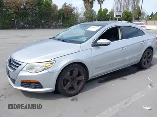 2009 Volkswagen CC 4Motion with VIN WVWGU73C49E514712, listed as a IAAI auction lot 42016839 with 1 mi miles. Bid and sale history available at carsss.com. Image 2.