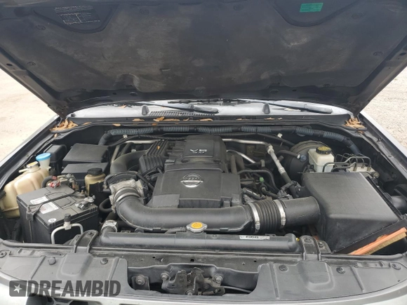 2007 Nissan Xterra SE z VIN 5N1AN08U87C531478, wystawiony jako Copart lot #56044185 z przebiegiem 161 305 mil mil oraz Szkoda całkowita • Salvage title. Historia ofert i sprzedaży dostępna na DreamBid. Obrazek 11.