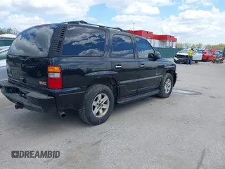 2003 GMC Yukon Denali z VIN 1GKEK63U13J340519, wystawiony jako IAAI lot #42035509 z przebiegiem 209 306 mil mil oraz . Historia ofert i sprzedaży dostępna na DreamBid. Obrazek 4.