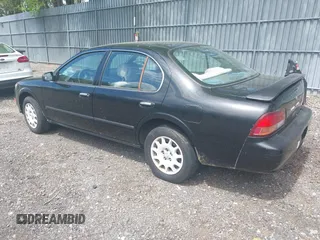1998 Nissan Maxima GXE with VIN JN1CA21D2WM923835, listed as a IAAI auction lot 42221419 with 256,441 mi miles and . Bid and sale history available at DreamBid. Image 3.