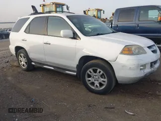 2005 Acura MDX Touring with VIN 2HNYD18665H558857, listed as a IAAI auction lot 41829809 with 157,147 mi miles. Bid and sale history available at carsss.com. Image 1.