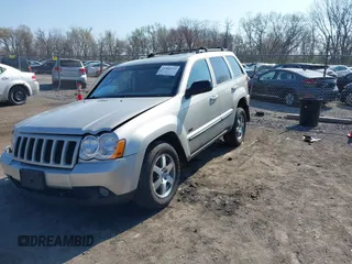 2008 Jeep Grand Cherokee Laredo with VIN 1J8GR48K28C169859, listed as a IAAI auction lot 41965149 with 166,069 mi miles. Bid and sale history available at carsss.com. Image 2.
