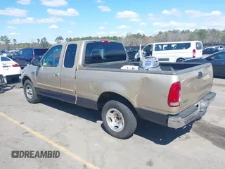 2000 Ford F-150 XL z VIN 1FTRX17L8YNB02069, wystawiony jako IAAI lot #41813272 z przebiegiem 279 042 mil mil oraz . Historia ofert i sprzedaży dostępna na DreamBid. Obrazek 3.