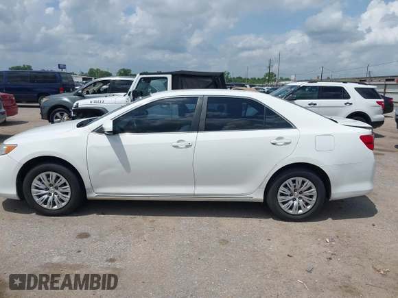 2014 Toyota Camry L with VIN 4T4BF1FK2ER375590, listed as a IAAI auction lot 42101553 with 126,849 mi miles and . Bid and sale history available at DreamBid. Image 14.