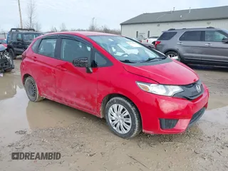 2015 Honda Fit LX z VIN 3HGGK5H54FM728448, wystawiony jako IAAI lot #41538650 z przebiegiem 115 450 mil mil oraz . Historia ofert i sprzedaży dostępna na DreamBid. Obrazek 1.