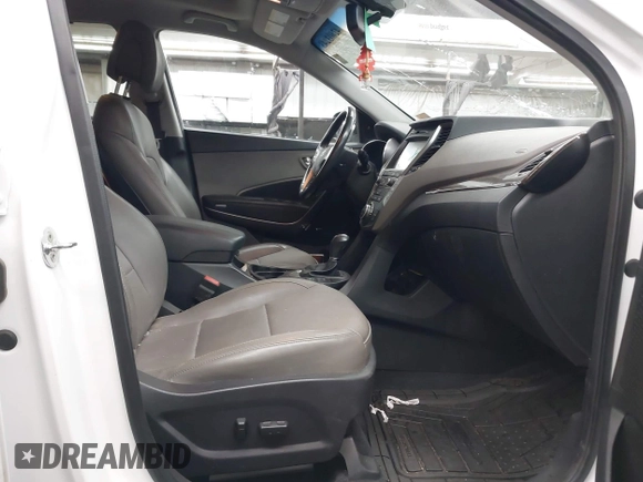 2017 Hyundai Santa Fe Ultimate with VIN 5NMZW4LA0HH040141, listed as a IAAI auction lot 42603243 with 140,817 mi miles and . Bid and sale history available at DreamBid. Image 5.
