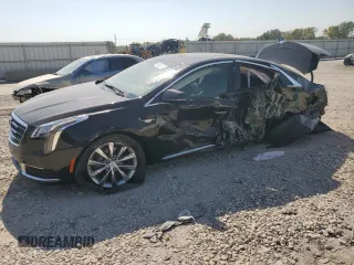 2018 Cadillac XTS Livery with VIN 2G61U5S37J9157936, listed as a Copart auction lot 74038874 with 92,661 mi miles and Salvage Title. Bid and sale history available at carsss.com. Image 1.