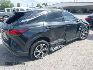 2023 Lexus RX with VIN JTJCHMAAXP2001561, listed as a IAAI auction lot 40850514 with 1 mi miles. Bid and sale history available at carsss.com. Image 4.