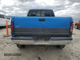 2001 Dodge 2500 z VIN 1B7KF236X1J198956, wystawiony jako Copart lot #52945405 z przebiegiem 216 448 mil mil oraz Czysty tytuł • Clean title. Historia ofert i sprzedaży dostępna na DreamBid. Obrazek 6.
