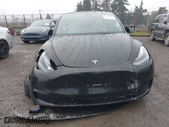 2021 Tesla Model Y Performance z VIN 5YJYGDEF2MF215938, wystawiony jako IAAI lot #41338287 z przebiegiem 63 925 mil mil oraz . Historia ofert i sprzedaży dostępna na DreamBid. Obrazek 11.