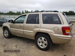 2001 Jeep Grand Cherokee Limited with VIN 1J4GW58S11C649736, listed as a Copart auction lot 66080214 with 199,584 mi miles and Salvage Title. Bid and sale history available at carsss.com. Image 2.