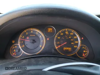 2005 Infiniti G35 z VIN JNKCV54E75M402615, wystawiony jako Copart lot #57704225 z przebiegiem 260 682 mil mil oraz Czysty tytuł • Clean title. Historia ofert i sprzedaży dostępna na DreamBid. Obrazek 9.