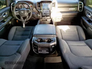 2023 Ram 1500 Big Horn with VIN 1C6SRFFT2PN666039, listed as a Copart auction lot 61458085 with 29,206 mi miles and Salvage title. Bid and sale history available at DreamBid. Image 8.