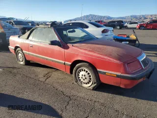 1989 Chrysler LeBaron z VIN 1C3XJ45K0KG251502, wystawiony jako Copart lot #87112404 z przebiegiem 166 445 mil mil oraz Tytuł czysty. Historia ofert i sprzedaży dostępna na DreamBid. Obrazek 4.
