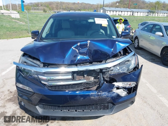 2016 Honda Pilot EX-L with VIN 5FNYF6H53GB078174, listed as a IAAI auction lot 42053669 with 94,259 mi miles and . Bid and sale history available at DreamBid. Image 12.