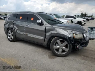 2011 Jeep Grand Cherokee Overland with VIN 1J4RR6GT8BC589021, listed as a Copart auction lot 67518174 with 0 mi miles and Salvage Title. Bid and sale history available at carsss.com. Image 4.