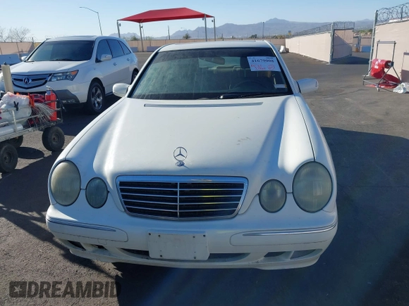 2002 Mercedes-Benz E-Class with VIN WDBJF65J22B455901, listed as a IAAI auction lot 41679008 with 153,854 mi miles. Bid and sale history available at carsss.com. Image 12.
