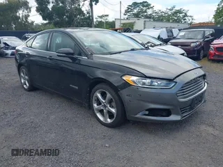 2013 Ford Fusion SE Hybrid with VIN 3FA6P0LUXDR181849, listed as a IAAI auction lot 41949276 with 112,688 mi miles and . Bid and sale history available at DreamBid. Image 1.