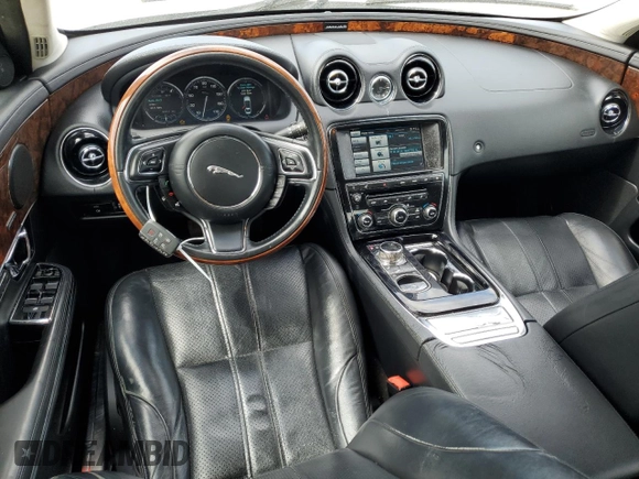 2015 Jaguar XJ with VIN SAJWA1CZ9F8V82974, listed as a Copart auction lot 59364344 with 64,012 mi miles and Salvage Title. Bid and sale history available at carsss.com. Image 8.