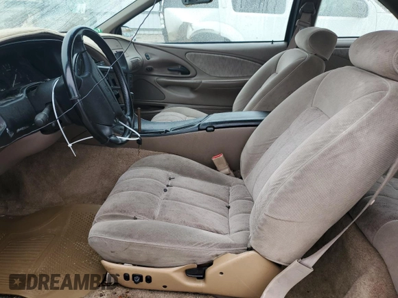 1994 Ford Thunderbird LX with VIN 1FALP6243RH223519, listed as a Copart auction lot 80962814 with 125,016 mi miles and Salvage Title. Bid and sale history available at DreamBid. Image 7.