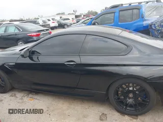 2013 BMW M6 z VIN WBSLX9C50DC968777, wystawiony jako IAAI lot #41966918 z przebiegiem 113 458 mil mil oraz . Historia ofert i sprzedaży dostępna na DreamBid. Obrazek 14.