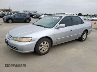 2002 Honda Accord EX z VIN 1HGCG56632A153133, wystawiony jako Copart lot #58973015 z przebiegiem 160 068 mil mil oraz Czysty tytuł • Clean title. Historia ofert i sprzedaży dostępna na DreamBid. Obrazek 1.