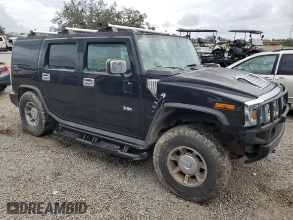 2003 Hummer H2 with VIN 5GRGN23U93H111760, listed as a Copart auction lot 79600154 with 154,552 mi miles and Salvage Title. Bid and sale history available at carsss.com. Image 4.