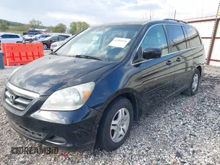 2007 Honda Odyssey EX-L with VIN 5FNRL38767B139398, listed as a IAAI auction lot 42044526 with 191,041 mi miles. Bid and sale history available at carsss.com. Image 2.