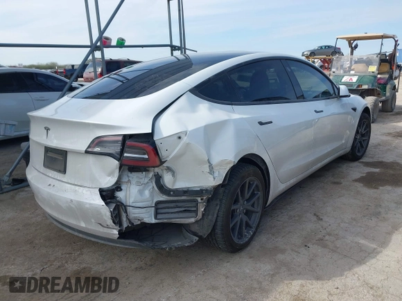 2019 Tesla Model 3 Mid Range with VIN 5YJ3E1EA6KF464615, listed as a IAAI auction lot 41306600 with 79,478 mi miles and . Bid and sale history available at DreamBid. Image 4.
