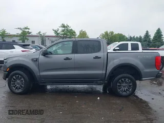 2023 Ford Ranger XL z VIN 1FTER4FH7PLE04499, wystawiony jako IAAI lot #42422898 z przebiegiem 21 618 mil mil oraz . Historia ofert i sprzedaży dostępna na DreamBid. Obrazek 14.